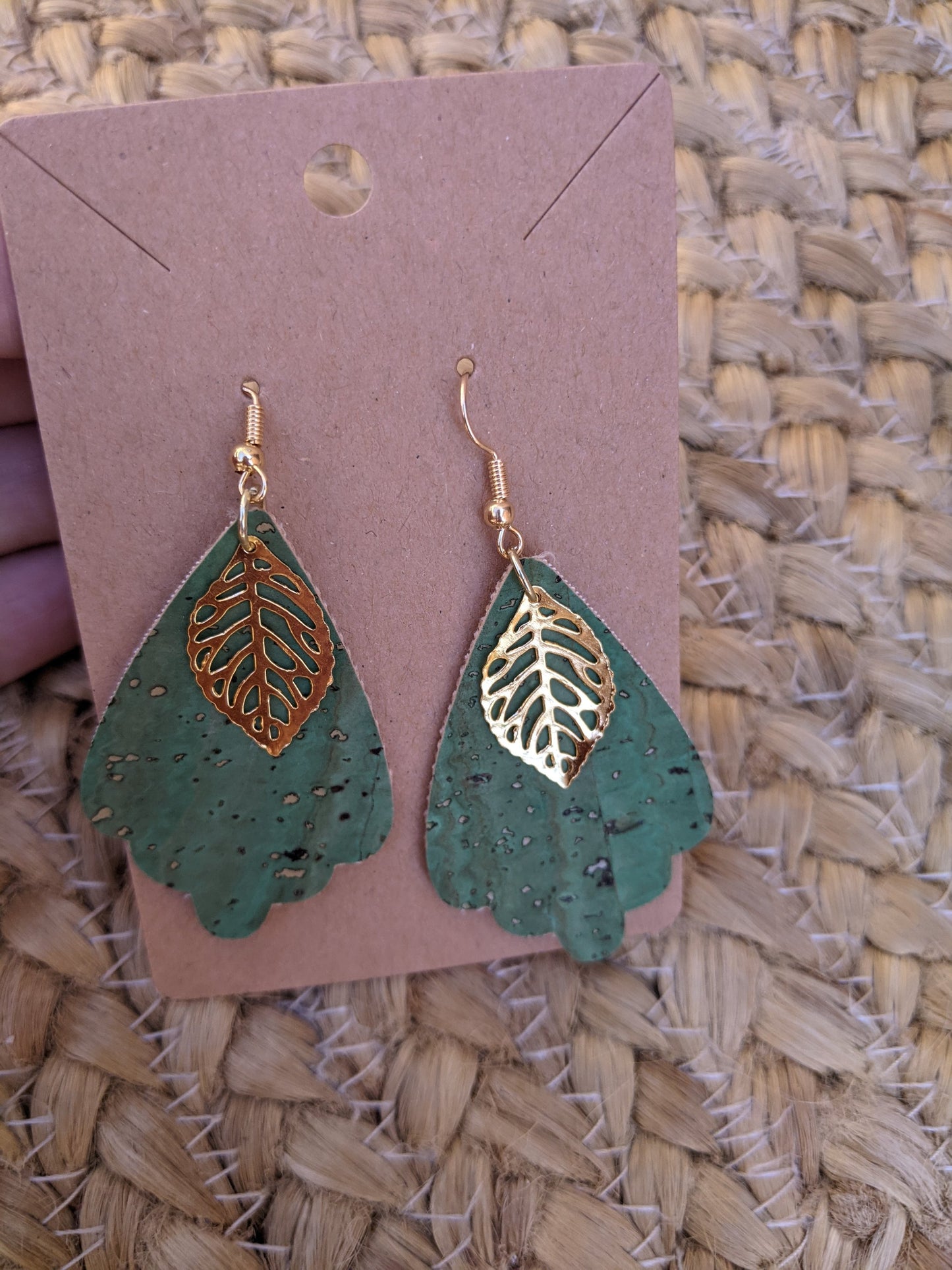 Handmade light green cork earrings with leaf filigree charm