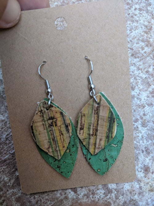 Handmade light green cork earrings with leaf filigree charm