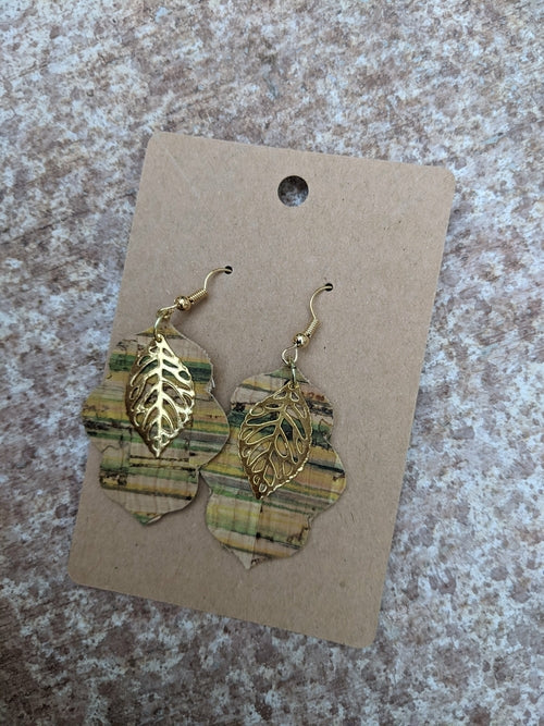 Handmade light green cork earrings with leaf filigree charm