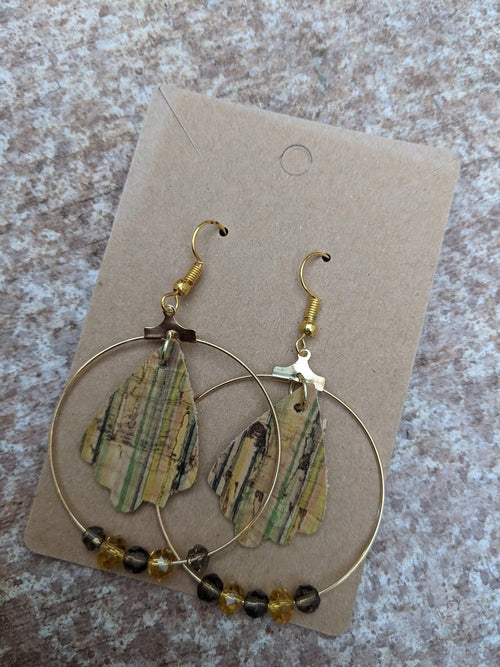 Handmade light green cork earrings with leaf filigree charm